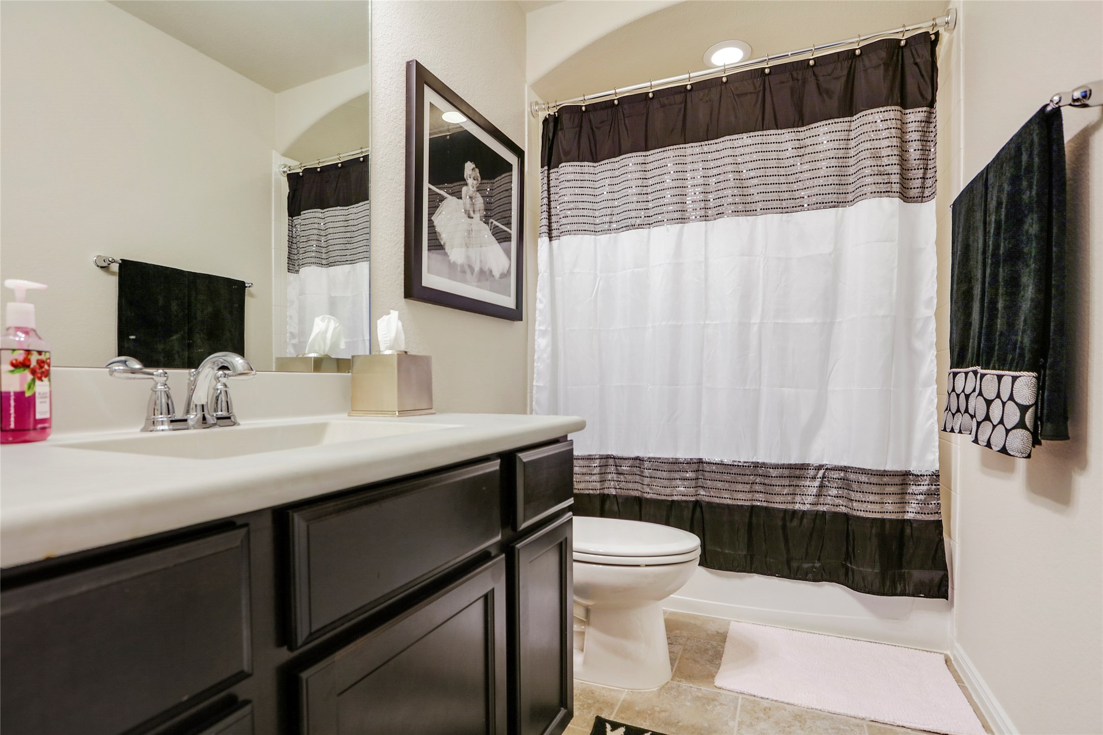 14141 Isle Royal Lane Conroe, TX 77384 - Photo 34 of 39 a bathroom with a sink toilet and shower