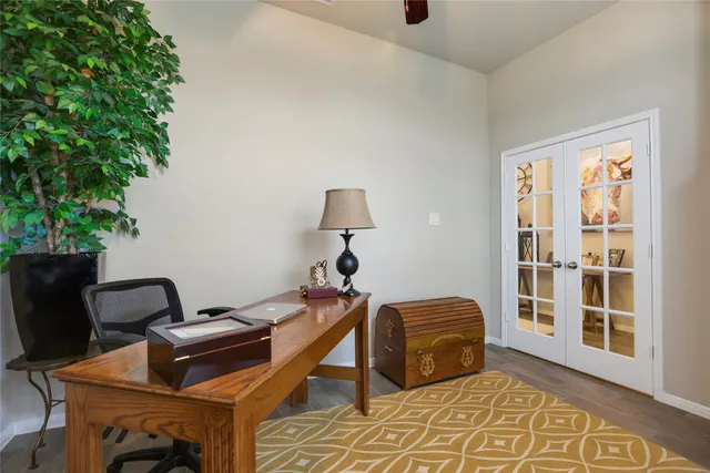 a bedroom with furniture and a window