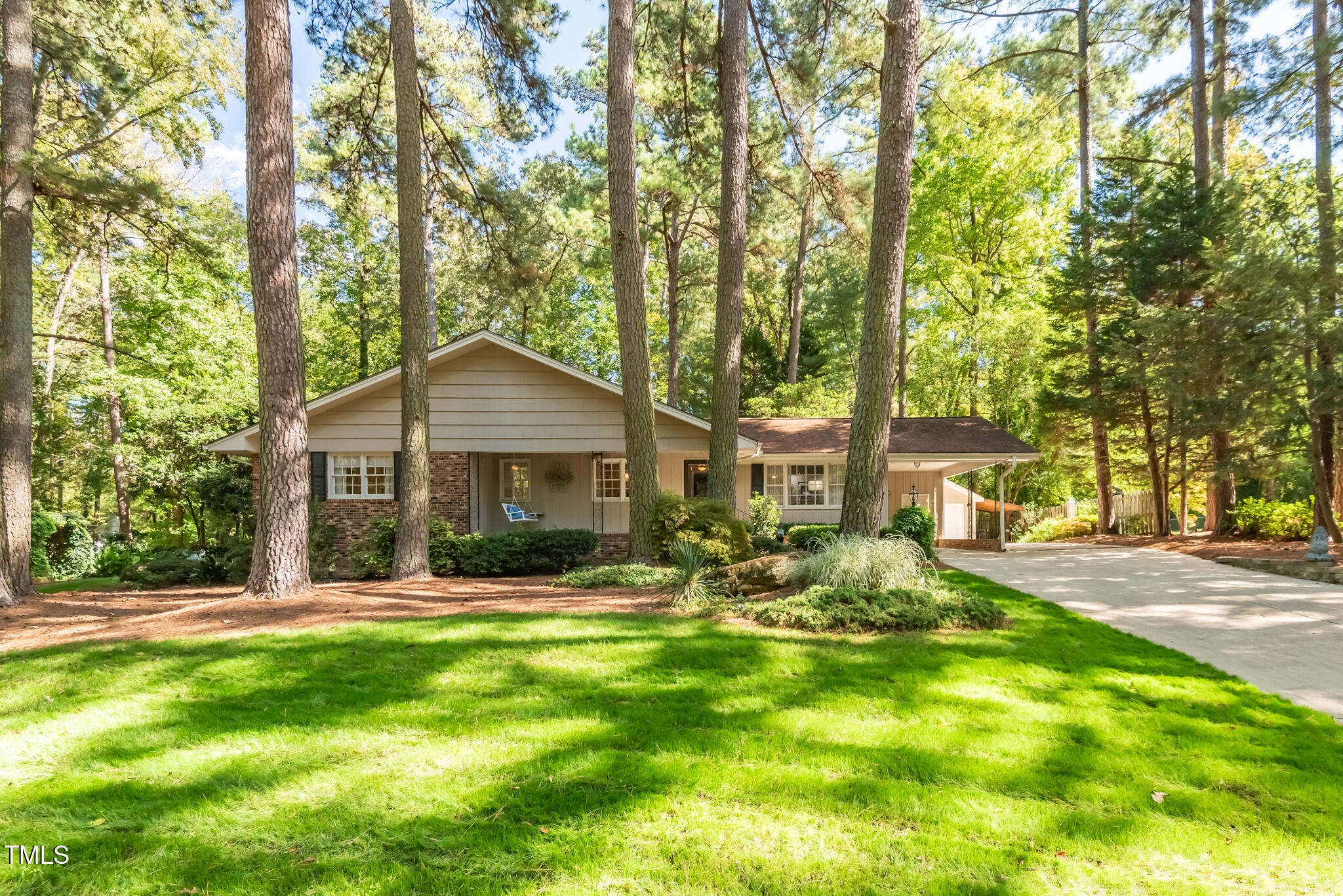 3404 Oates Drive Raleigh, NC 27604 - Photo 3 of 43 a front view of a house with a yard