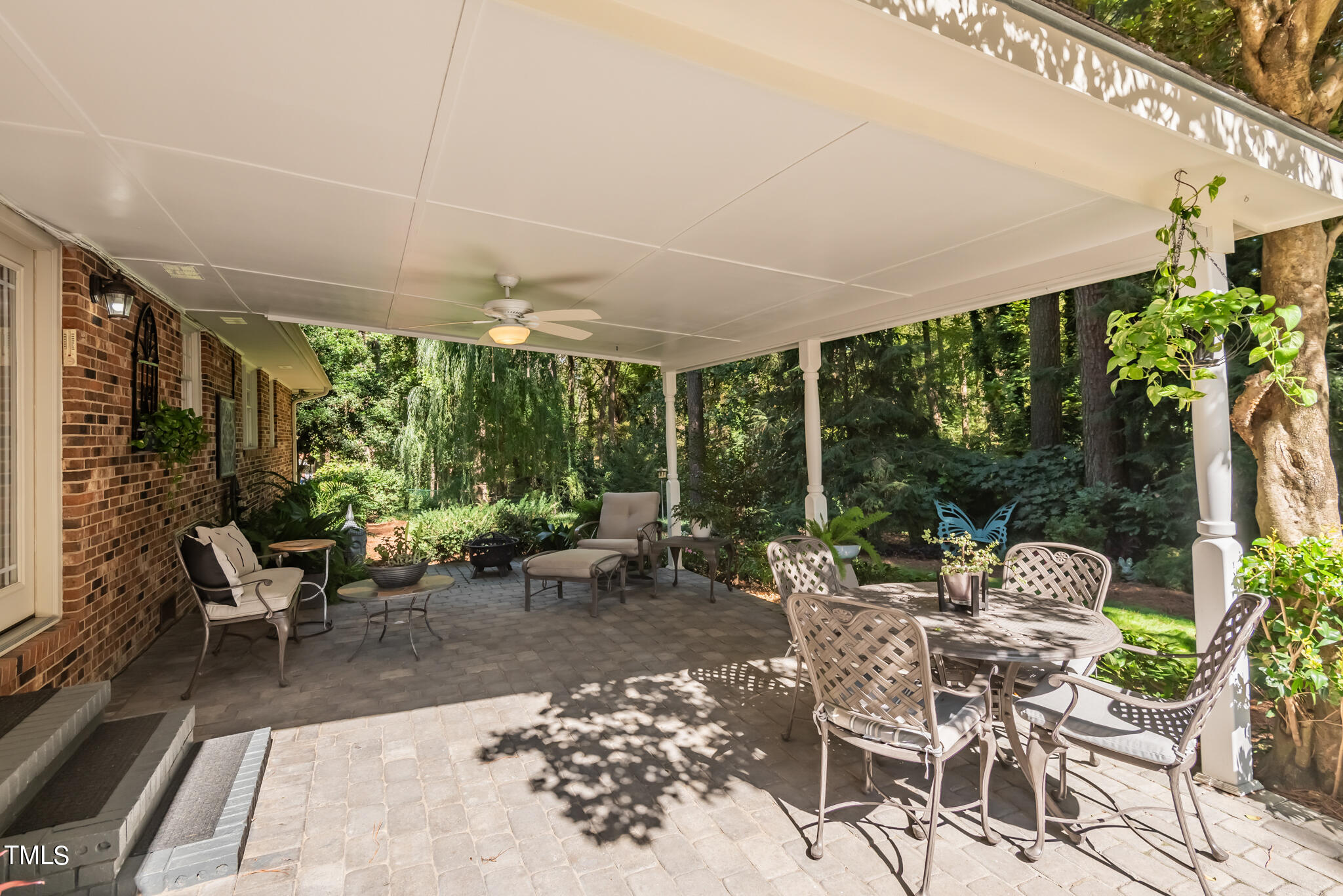 3404 Oates Drive Raleigh, NC 27604 - Photo 33 of 43 a living room with patio furniture and garden view