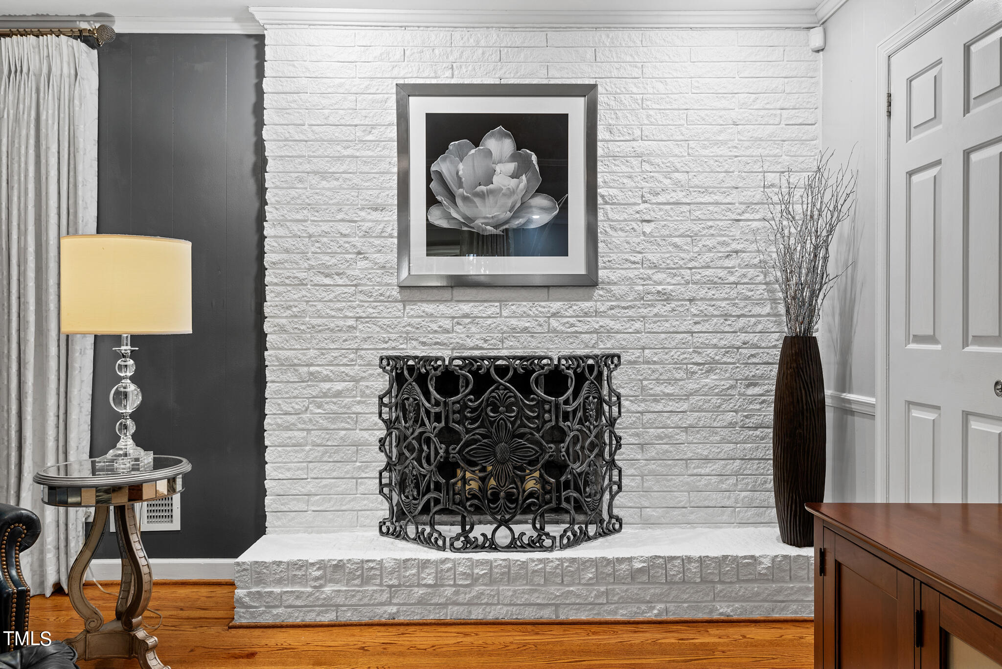 3404 Oates Drive Raleigh, NC 27604 - Photo 10 of 43 a living room with furniture and a fireplace