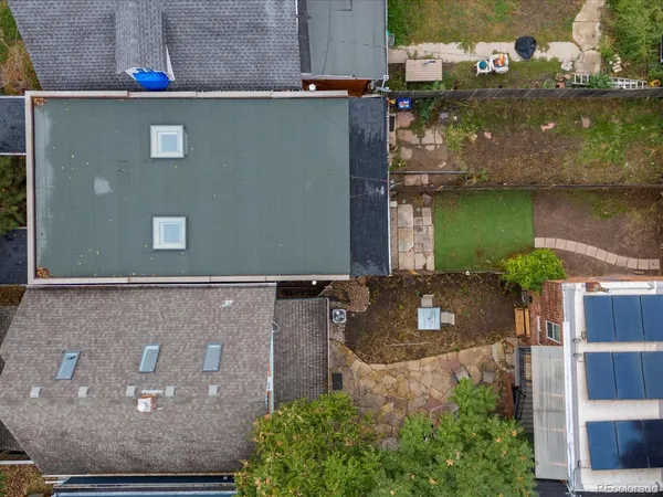 an aerial view of house with yard