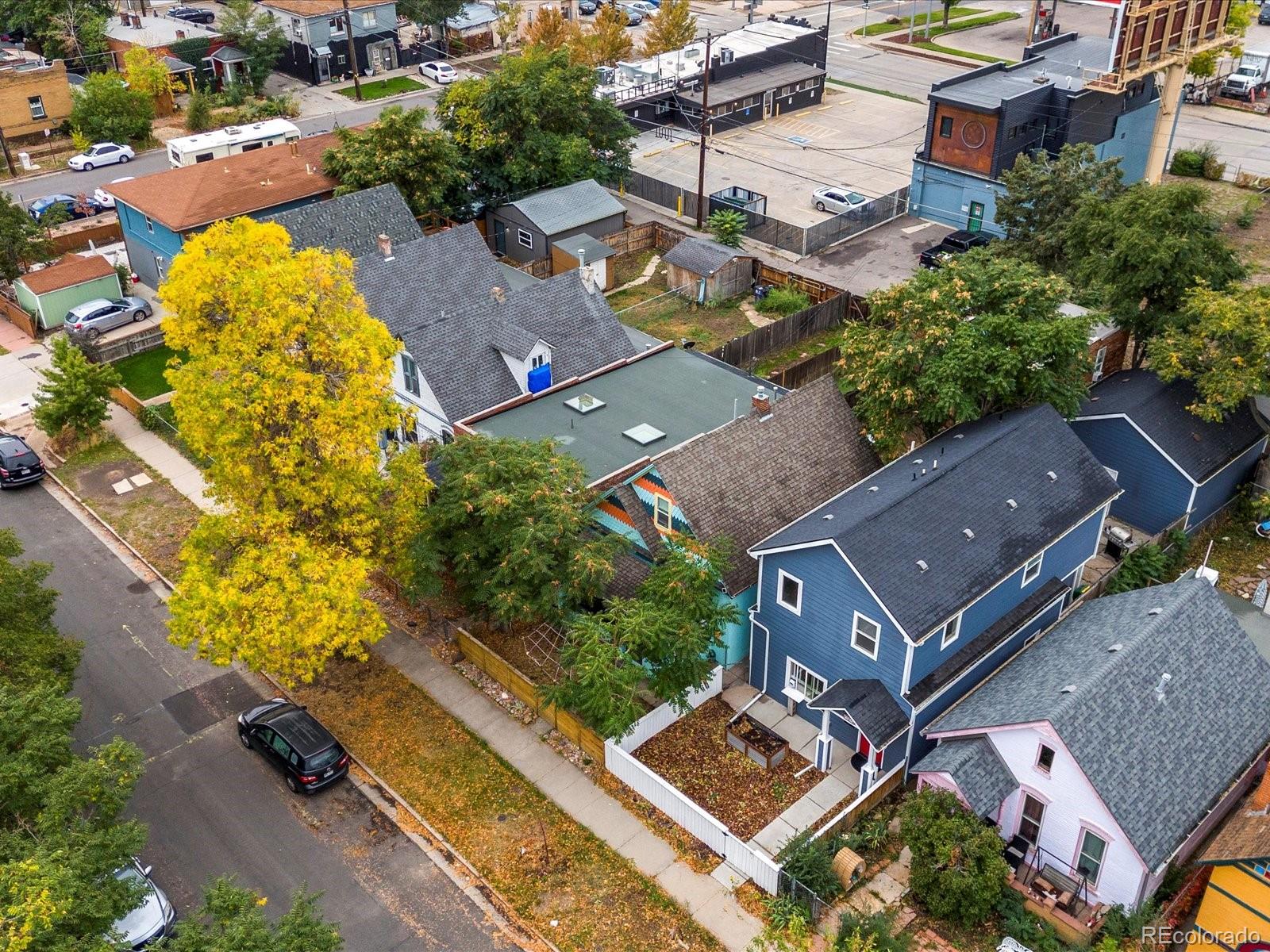 321-323 Inca Street Denver, CO 80223 - Photo 23 of 27 an aerial view of residential house with outdoor space and swimming pool