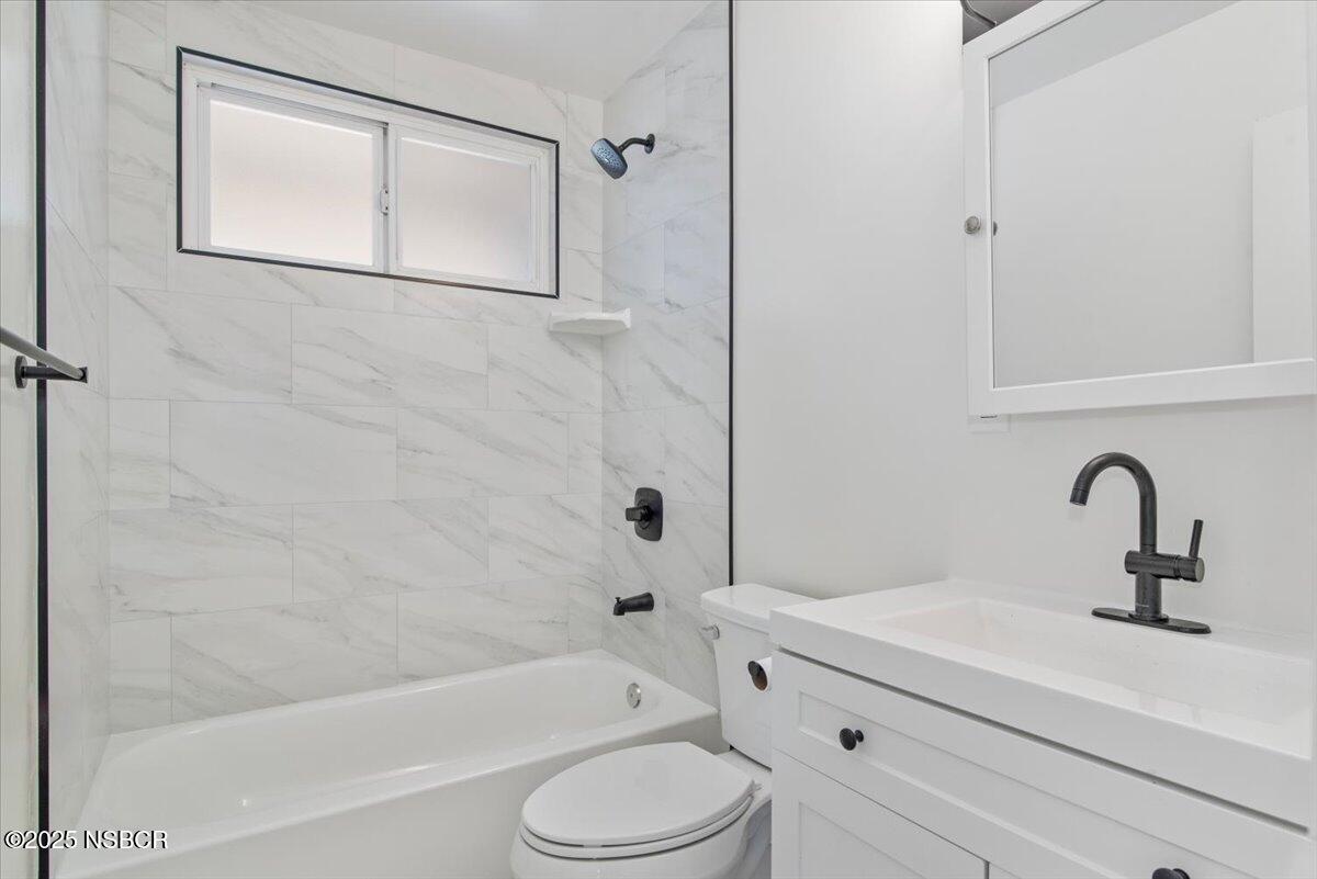 3446 Rucker Road Lompoc, CA 93436 - Photo 7 of 26 a bathroom with a sink toilet and shower