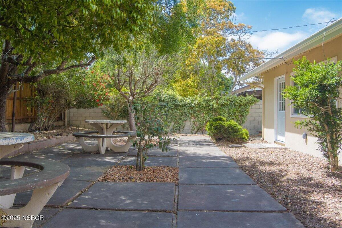 3446 Rucker Road Lompoc, CA 93436 - Photo 9 of 26 a view of a backyard with sitting area