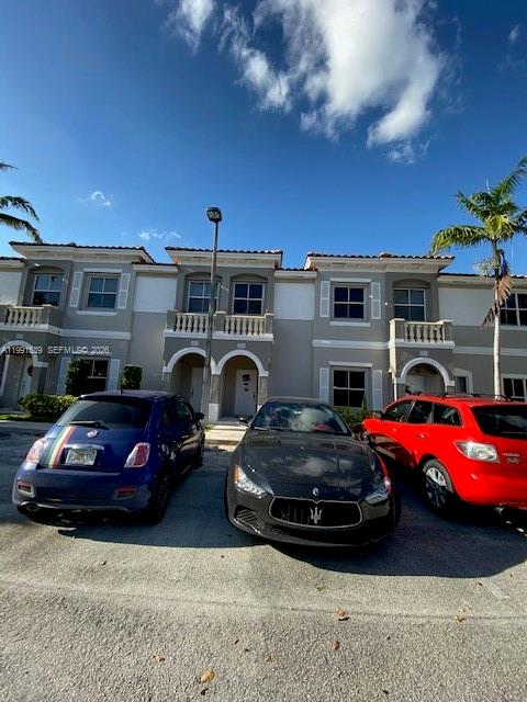 a car parked in front of a house