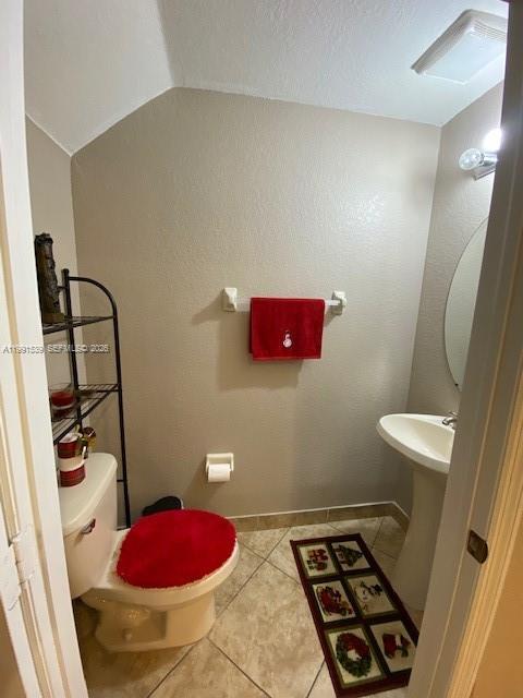 4920 Southwest 140th Terrace, Unit 4 Miramar, FL 33027 - Photo 6 of 15 a bathroom with a sink and a mirror