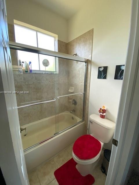 4920 Southwest 140th Terrace, Unit 4 Miramar, FL 33027 - Photo 9 of 15 a bathroom with a shower and a toilet