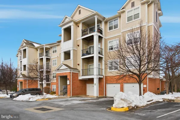 a front view of a building with a snow