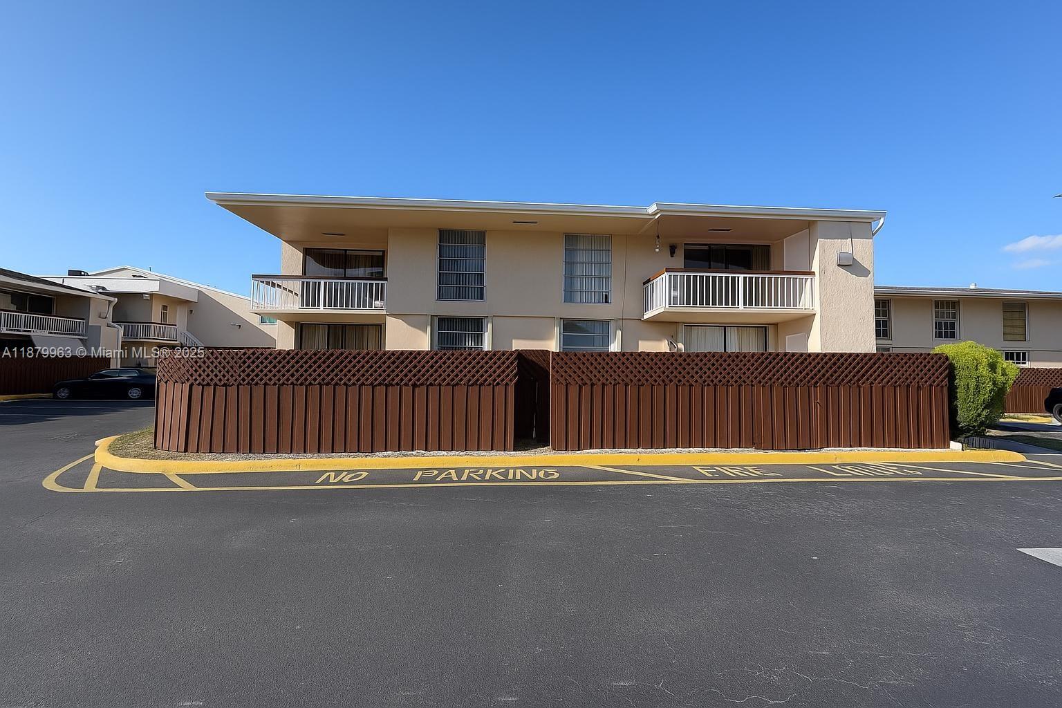 13781 Southwest 66th Street, Unit 221B Miami, FL 33183 - Photo 10 of 16 a view of a house with a patio