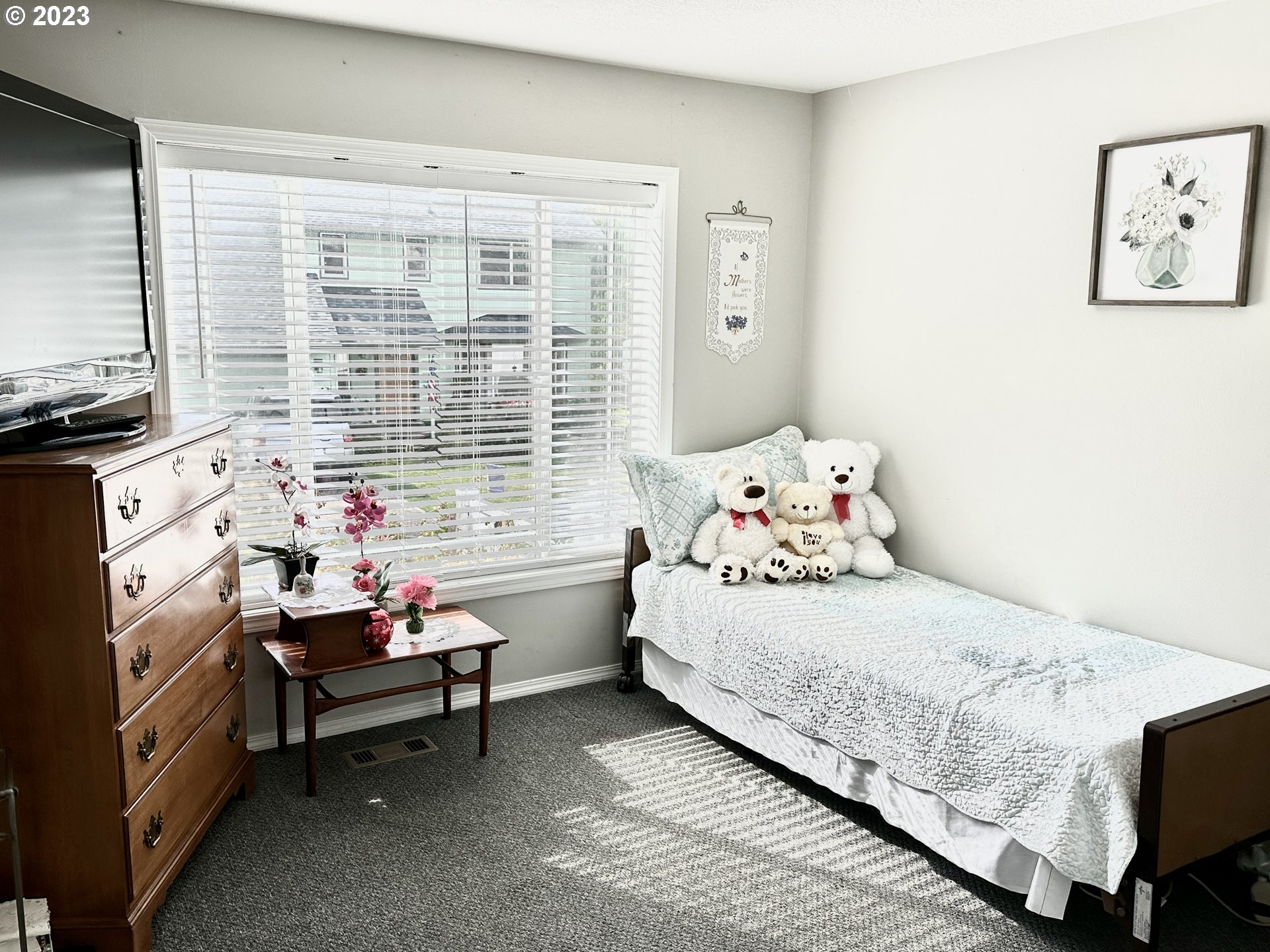 Undisclosed Address Vancouver, WA 98665 - Photo 12 of 16 a bedroom with a bed and a window