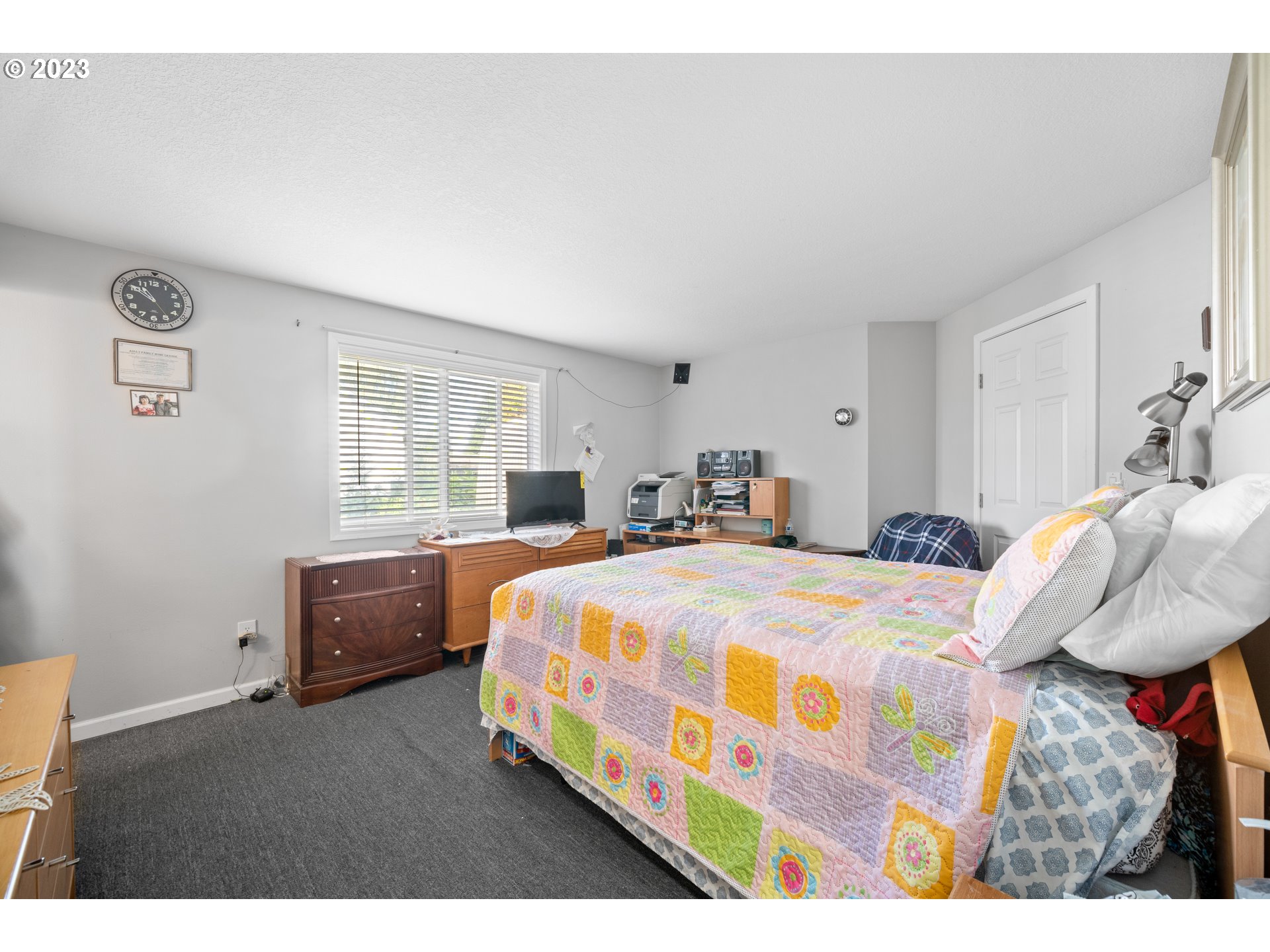 Undisclosed Address Vancouver, WA 98665 - Photo 8 of 16 a bedroom with a bed and window