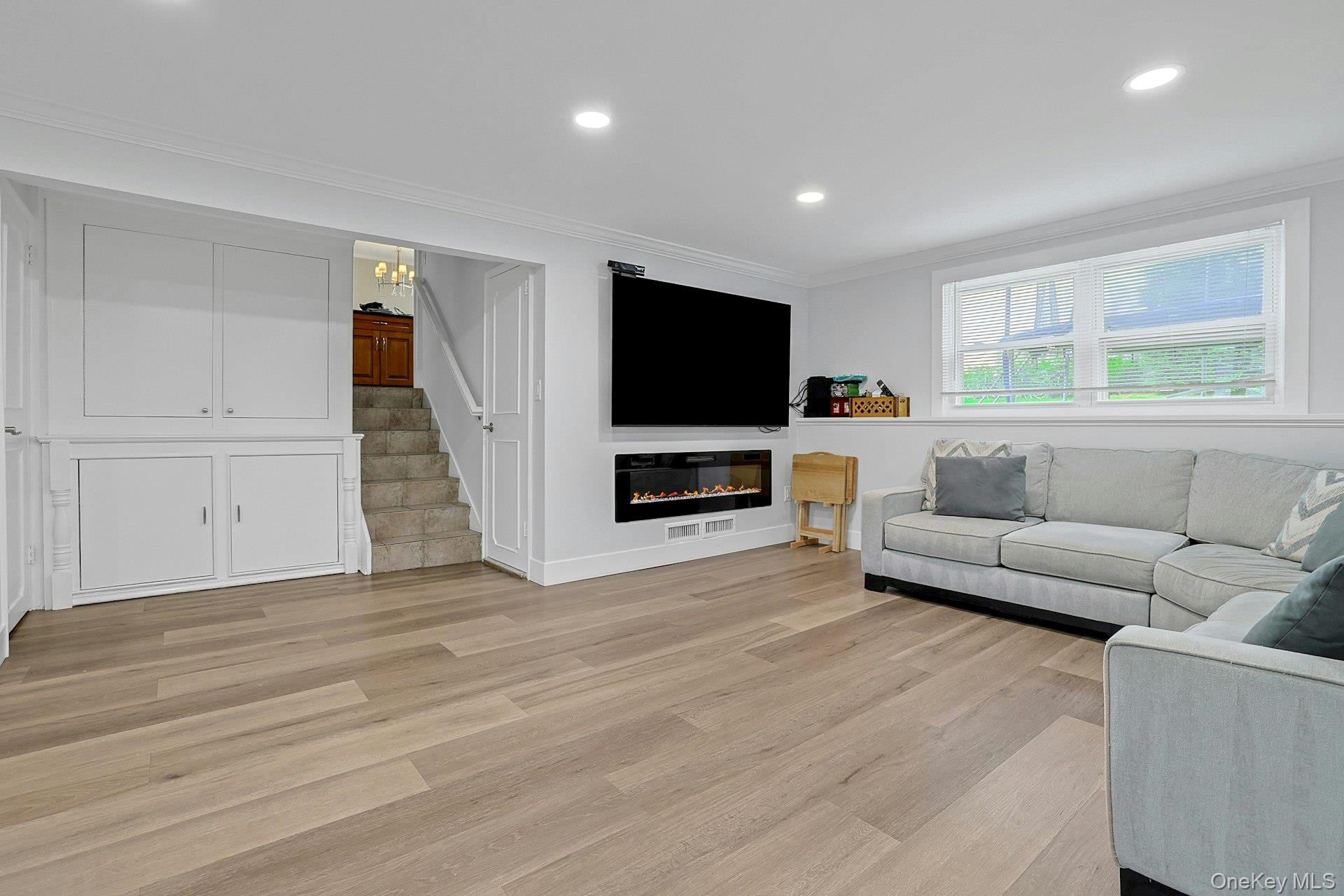 70 Durham Road White Plains, NY 10607 - Photo 21 of 32 Lower Level with Fireplace