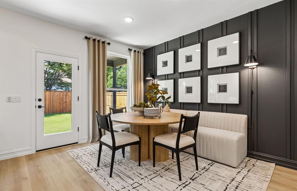 *Model Representation - Dining area off kitchen with large windows