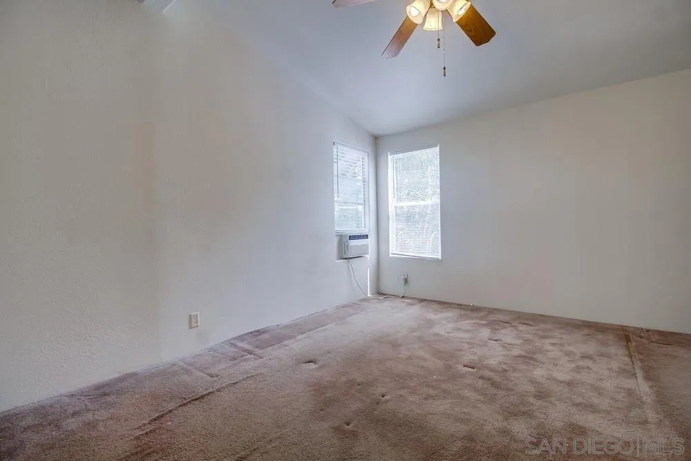 9902 Jamacha Boulevard, Unit 102 Spring Valley, CA 91977 - Photo 10 of 17 a view of an empty room with a window