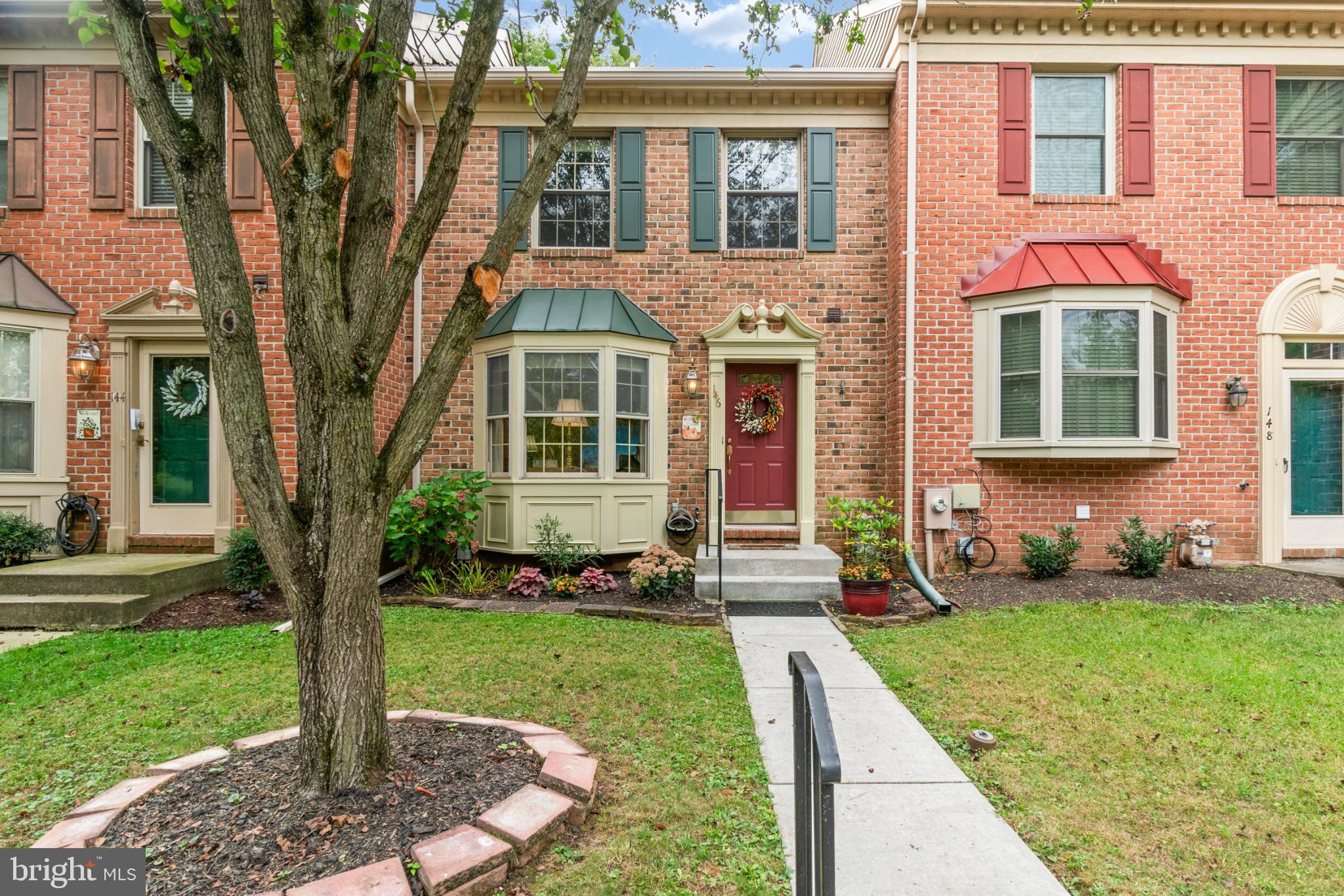 146 English Run Circle Sparks, MD 21152 - Photo 2 of 37 Charming brick townhouse with inviting entry.