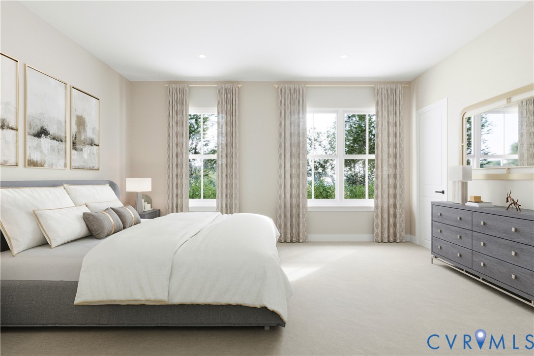 2616 Calgary Drive Chester, VA 23831 - Photo 6 of 14 a spacious bedroom with a large bed and a window