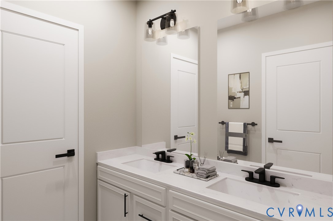 2616 Calgary Drive Chester, VA 23831 - Photo 7 of 14 a bathroom with a sink and a mirror