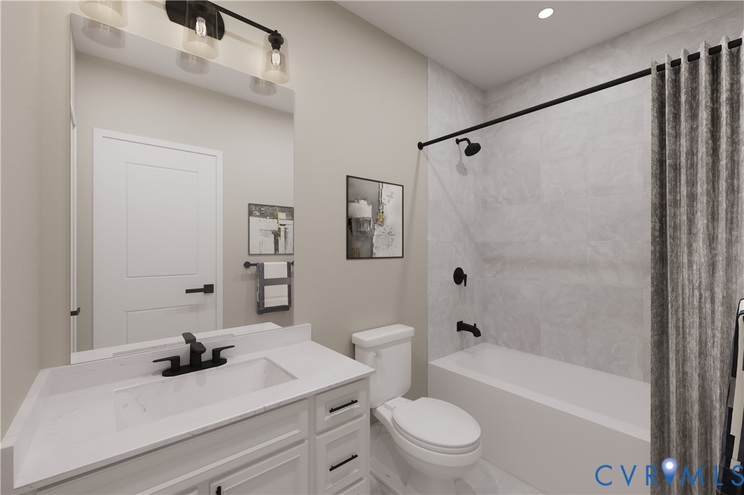 2616 Calgary Drive Chester, VA 23831 - Photo 9 of 14 a bathroom with a sink a toilet and a bathtub