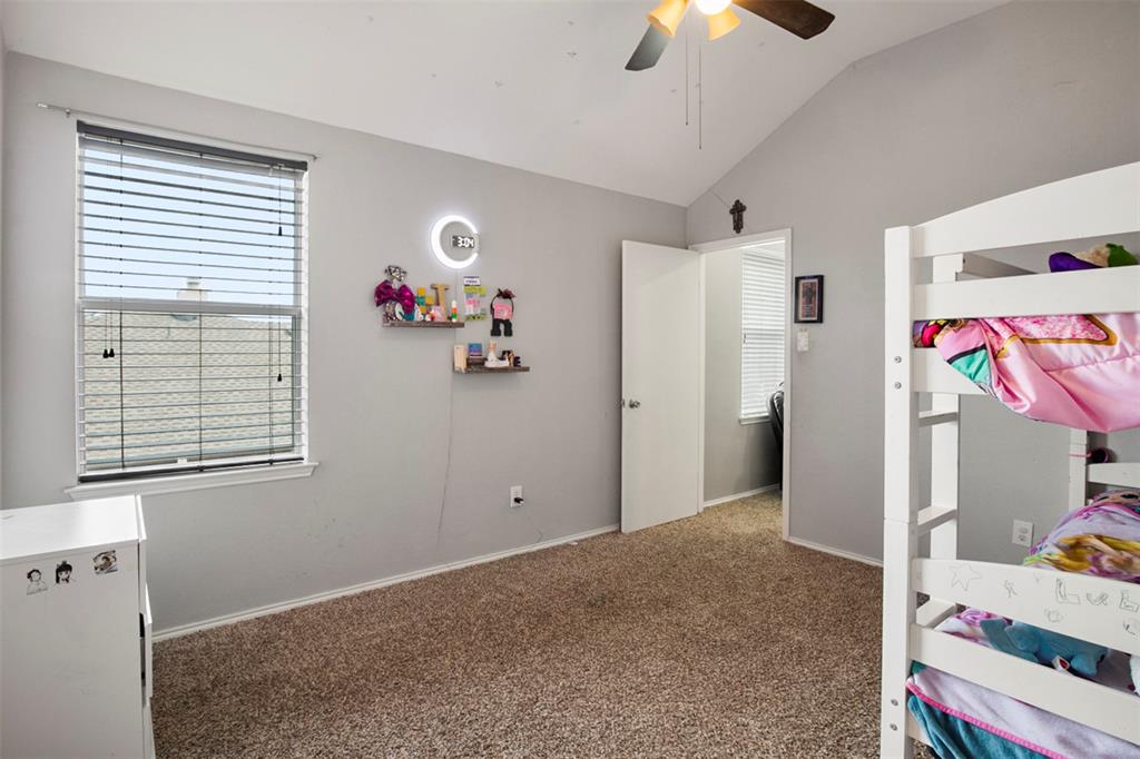 130 Cherrytree Trail Forney, TX 75126 - Photo 17 of 31 a view of a livingroom with an empty space & a ceiling fan a kitchen