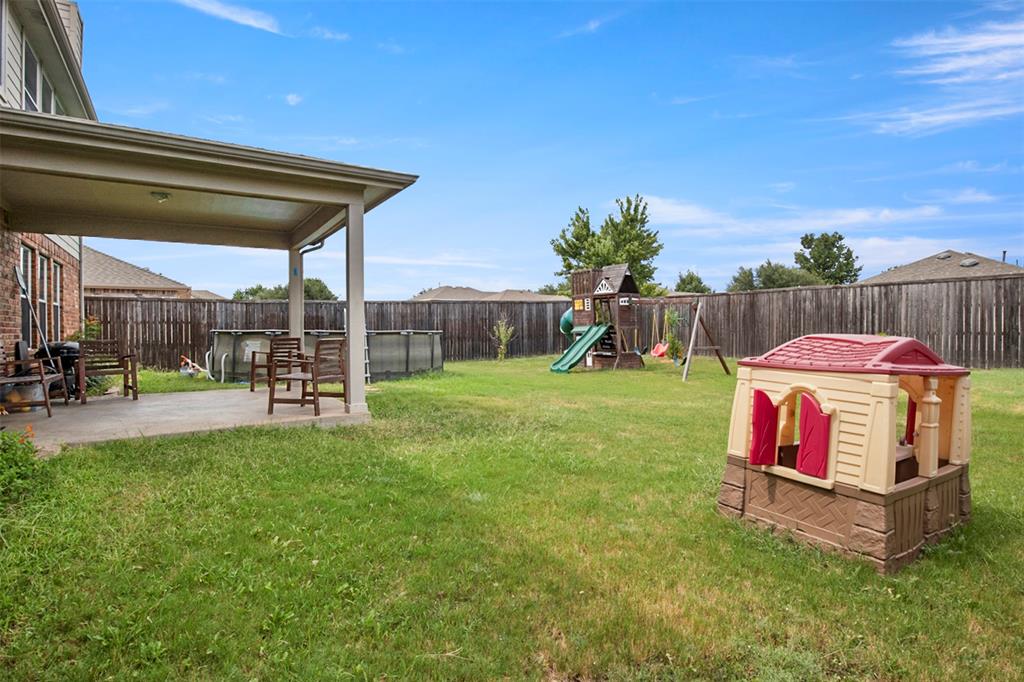 130 Cherrytree Trail Forney, TX 75126 - Photo 28 of 31 a view of swimming pool with a yard