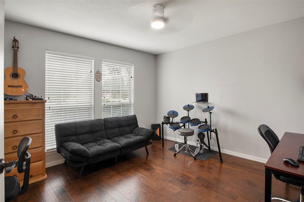 130 Cherrytree Trail Forney, TX 75126 - Photo 4 of 31 a living room with furniture and a window