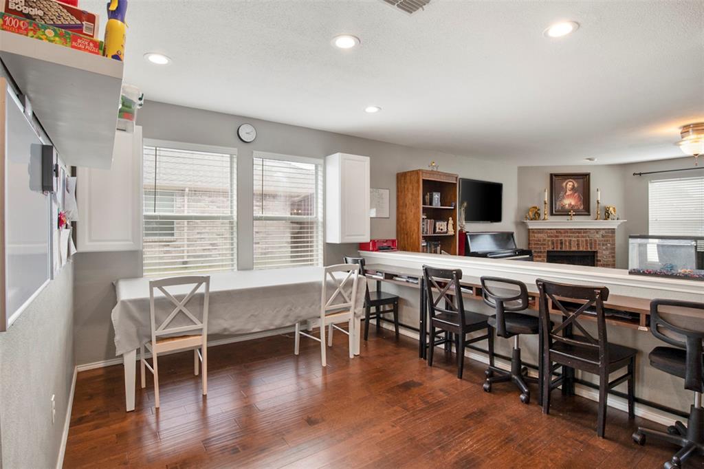 130 Cherrytree Trail Forney, TX 75126 - Photo 5 of 31 a view of a dining room with furniture window and wooden floor