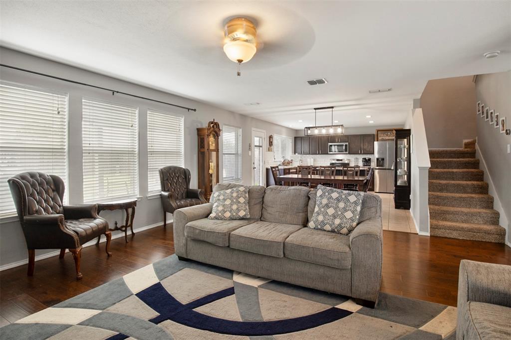 130 Cherrytree Trail Forney, TX 75126 - Photo 9 of 31 a living room with furniture and a large window