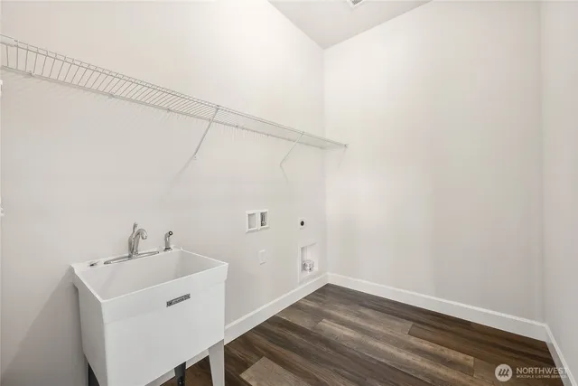 a bathroom with a sink and vanity