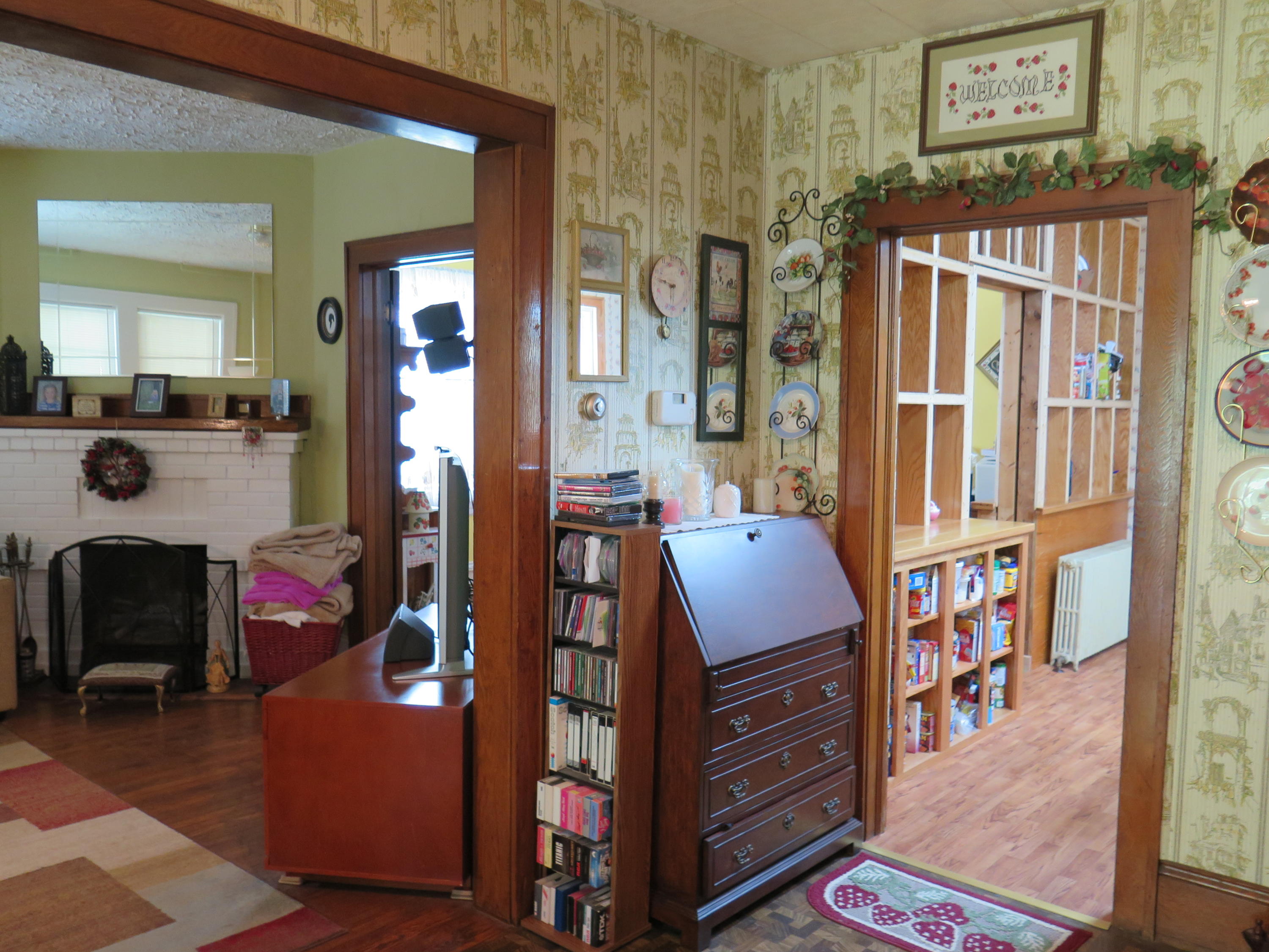 2315 Rutrough Road Southeast Roanoke, VA 24014 - Photo 11 of 38 a living room with furniture and a baby crib