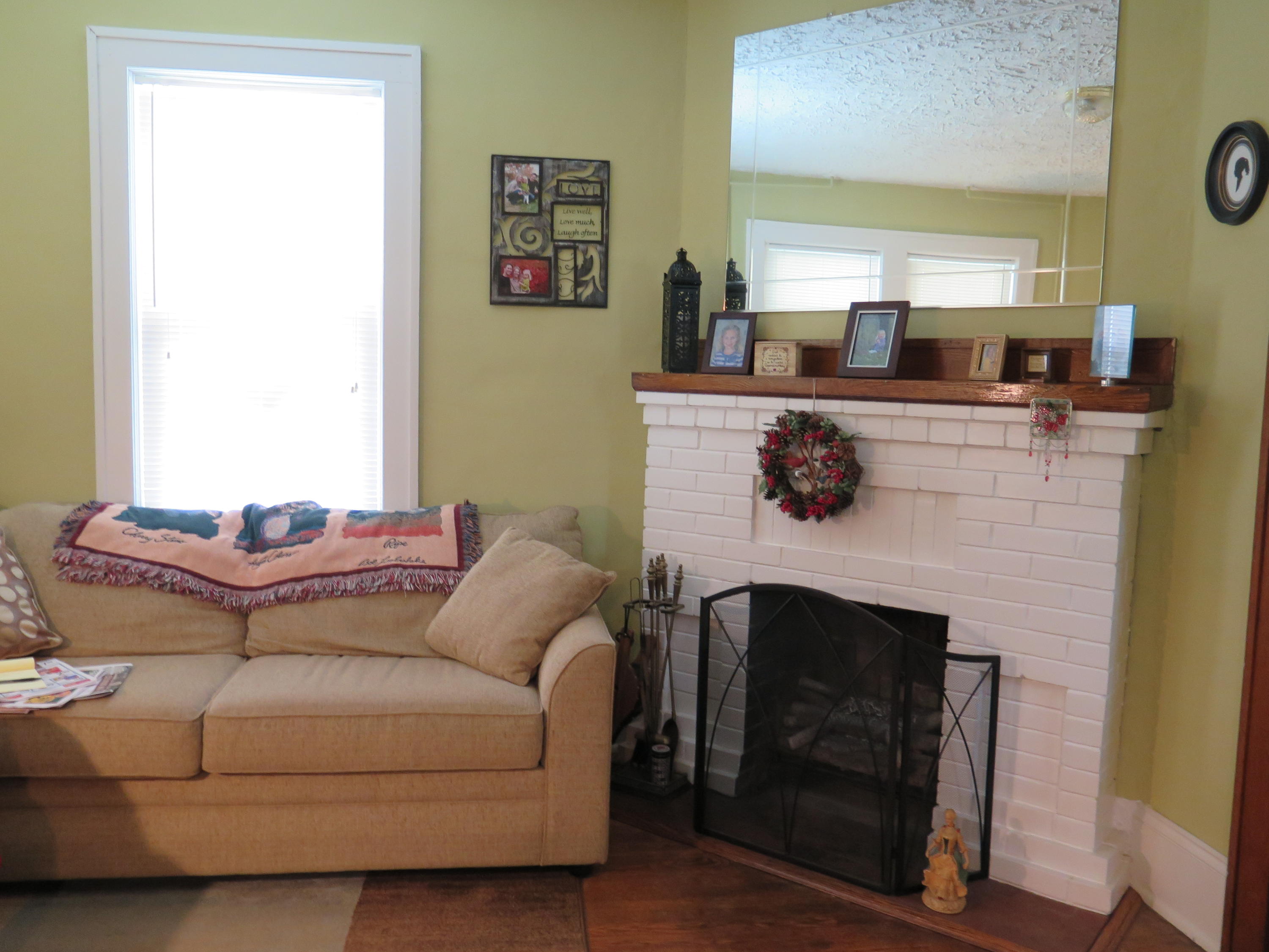 2315 Rutrough Road Southeast Roanoke, VA 24014 - Photo 12 of 38 a living room with furniture and a fireplace