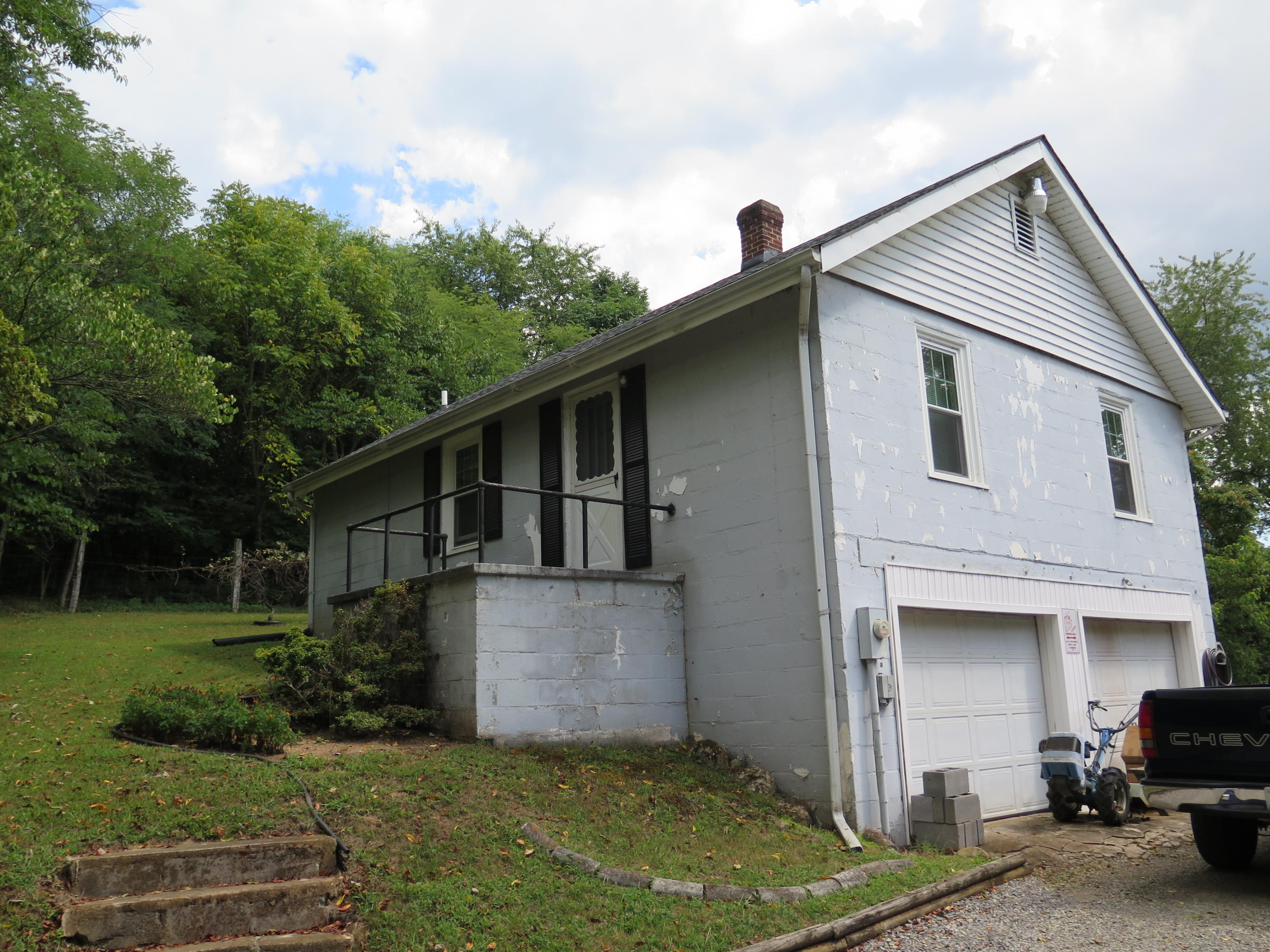 2315 Rutrough Road Southeast Roanoke, VA 24014 - Photo 27 of 38 a front view of a house with a garden