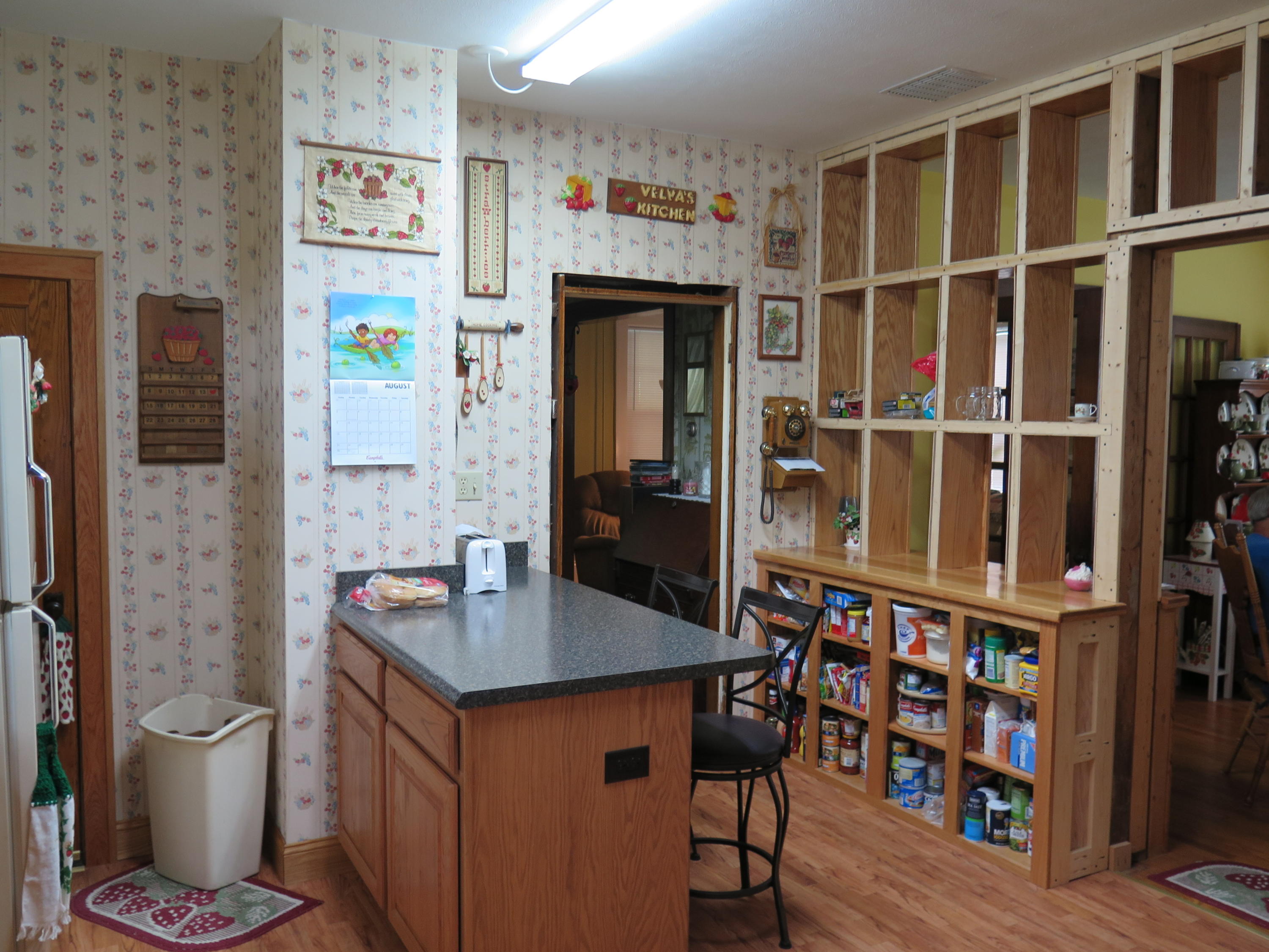 2315 Rutrough Road Southeast Roanoke, VA 24014 - Photo 4 of 38 a view of kitchen island with furniture and wooden floor