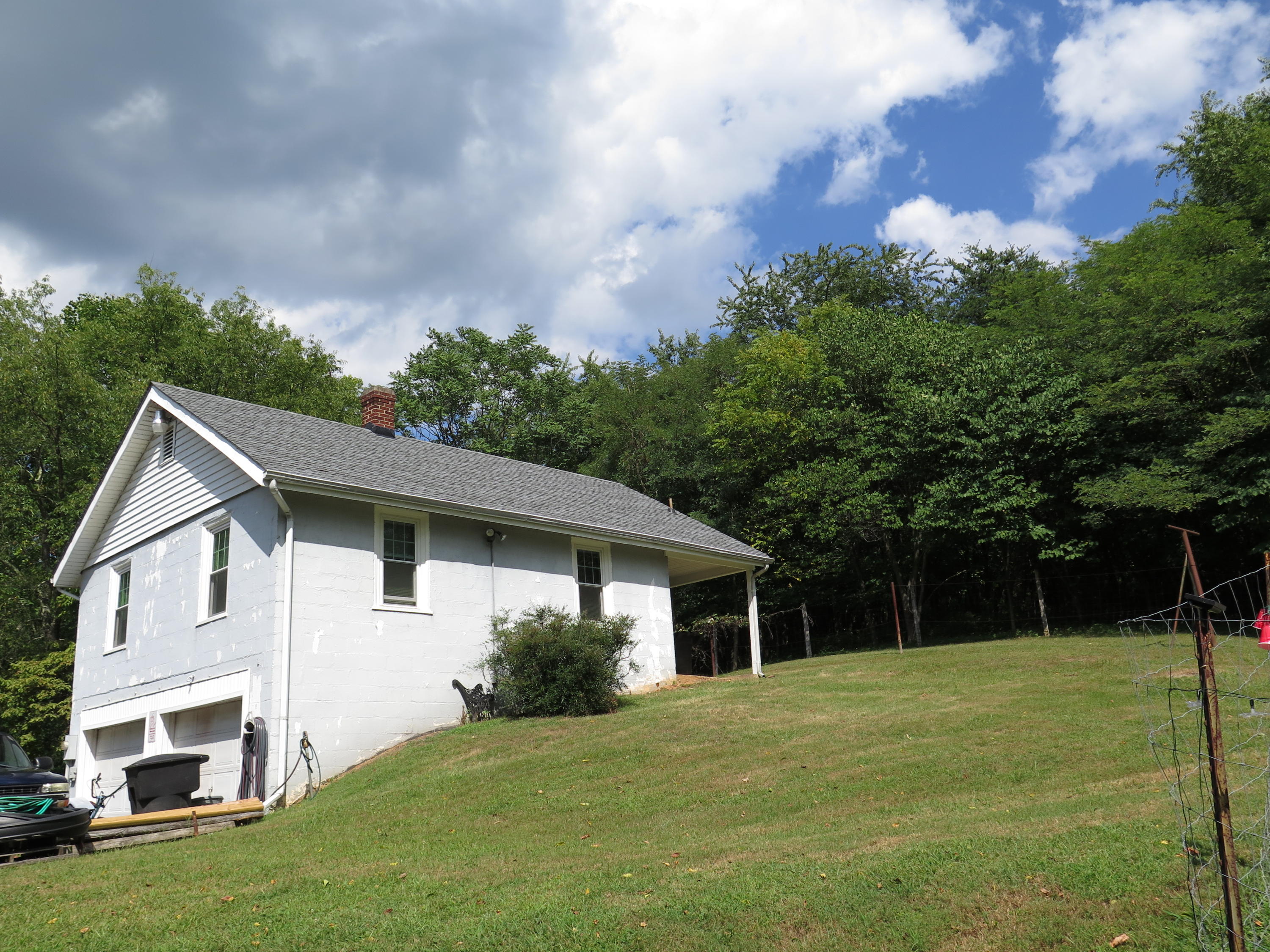 2315 Rutrough Road Southeast Roanoke, VA 24014 - Photo 32 of 38 a house that has a tree in front of it
