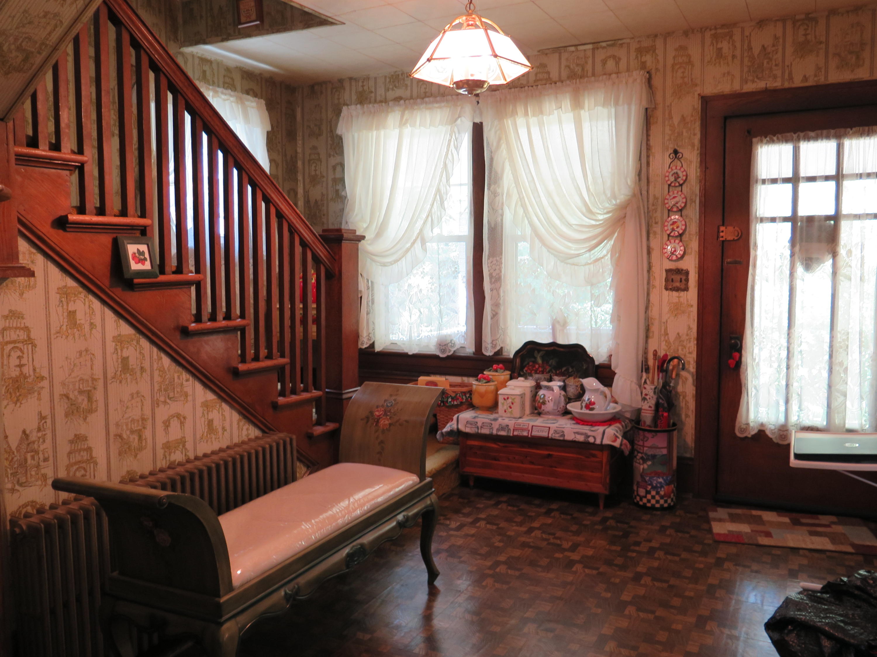 2315 Rutrough Road Southeast Roanoke, VA 24014 - Photo 9 of 38 a living room with furniture and a chandelier