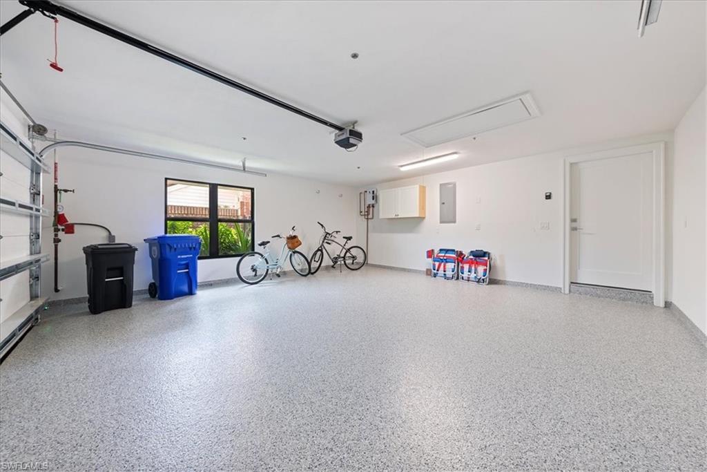 569 Park Shore Drive, Unit G5 Naples, FL 34103 - Photo 22 of 45 a room with furniture and clutter