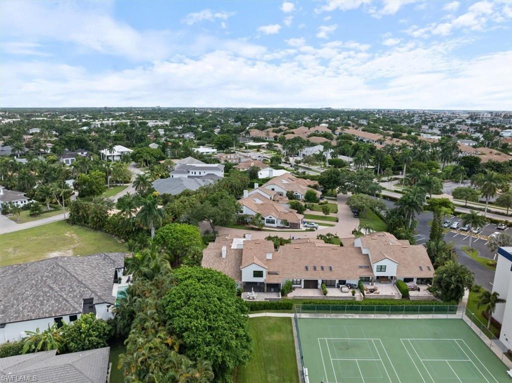 569 Park Shore Drive, Unit G5 Naples, FL 34103 - Photo 41 of 45 an aerial view of a house with a garden