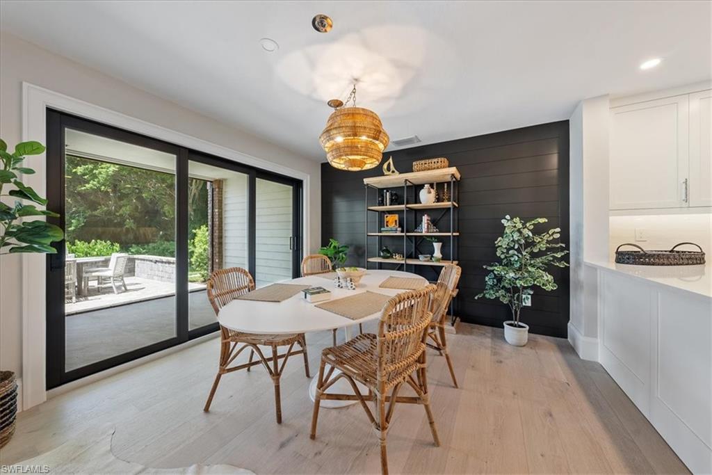 569 Park Shore Drive, Unit G5 Naples, FL 34103 - Photo 9 of 45 a view of a dining room with furniture window and outside view