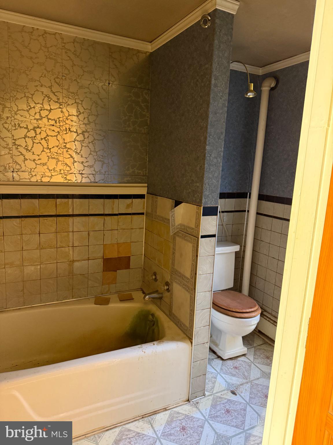 43 Main Street Tremont, PA 17981 - Photo 14 of 21 a bathroom with a shower and a toilet