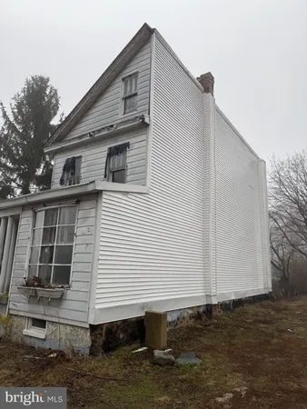 a front view of a house with garage
