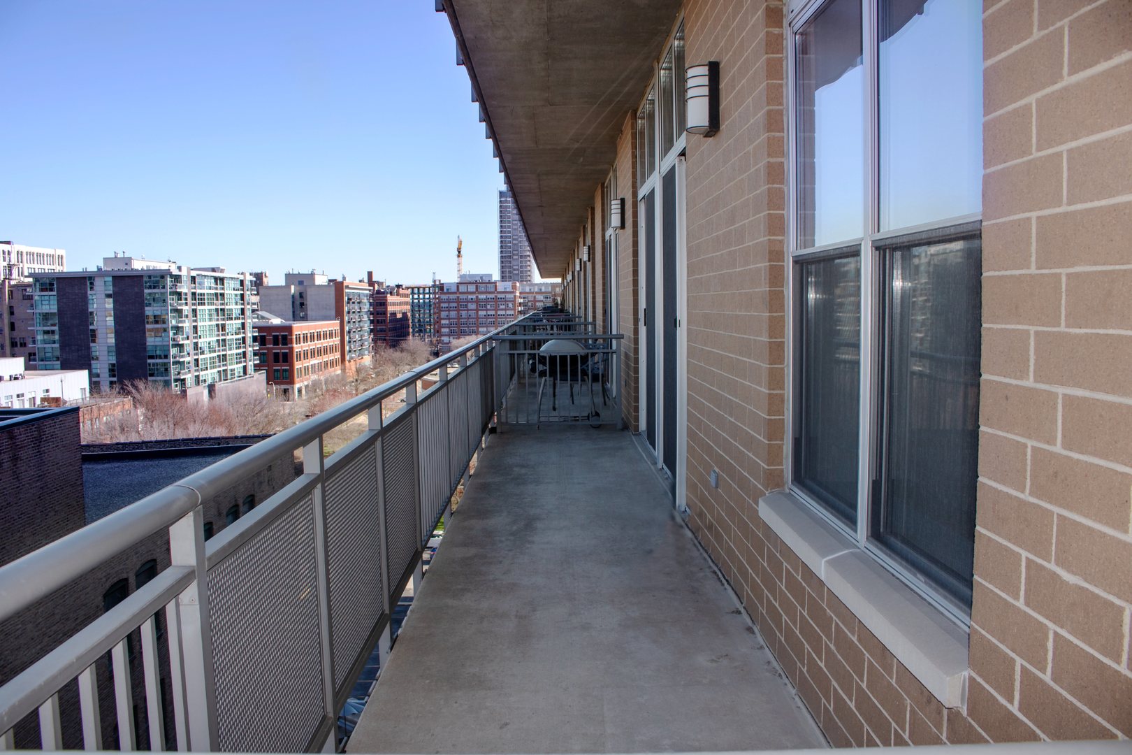 111 South Morgan Street, Unit 824 Chicago, IL 60607 - Photo 17 of 18 a view of city from balcony