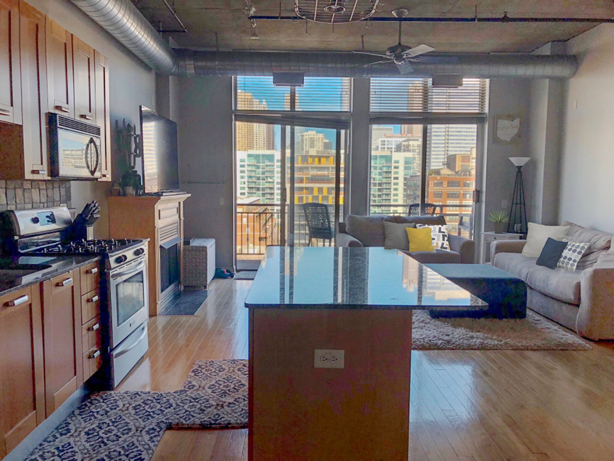 111 South Morgan Street, Unit 824 Chicago, IL 60607 - Photo 4 of 18 a living room with large window