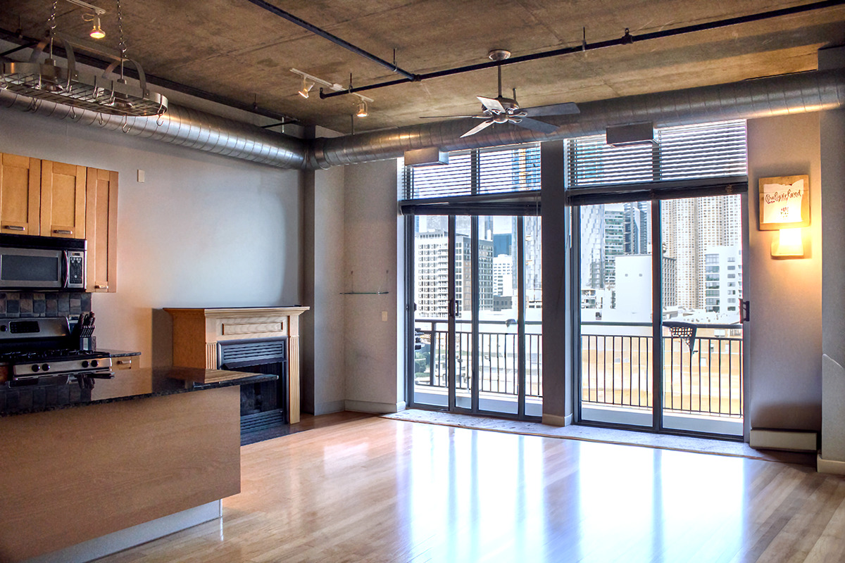 111 South Morgan Street, Unit 824 Chicago, IL 60607 - Photo 5 of 18 a view of a livingroom with furniture