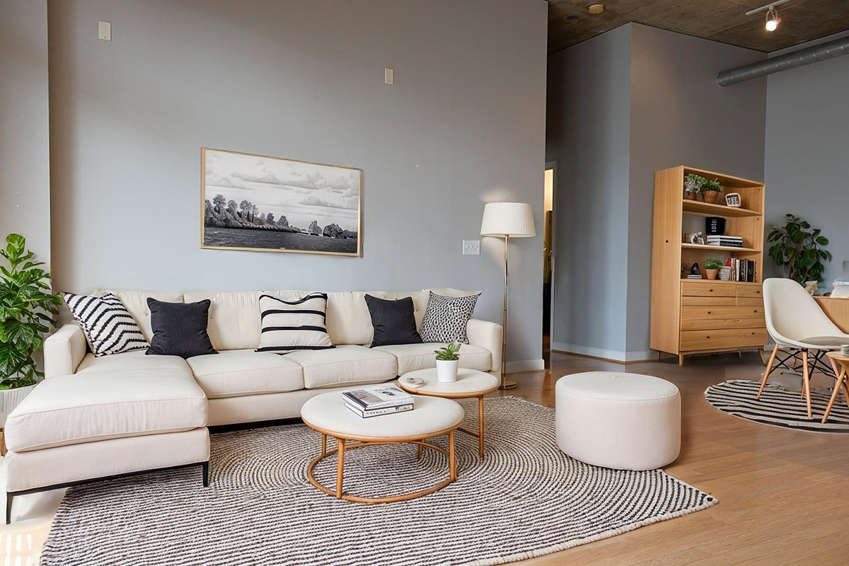 111 South Morgan Street, Unit 824 Chicago, IL 60607 - Photo 7 of 18 a living room with furniture a rug and a lamp