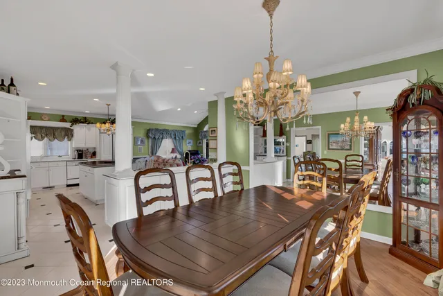 a view of a kitchen with furniture and windows