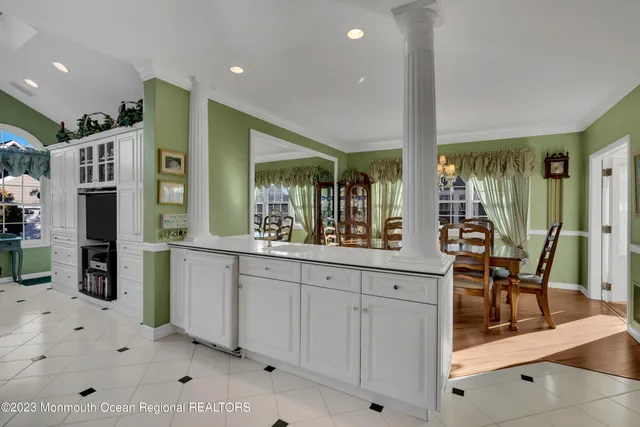 a view of living room with furniture and window