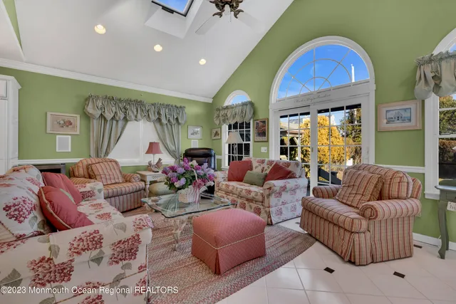 a bathroom with a sink a toilet and a shower
