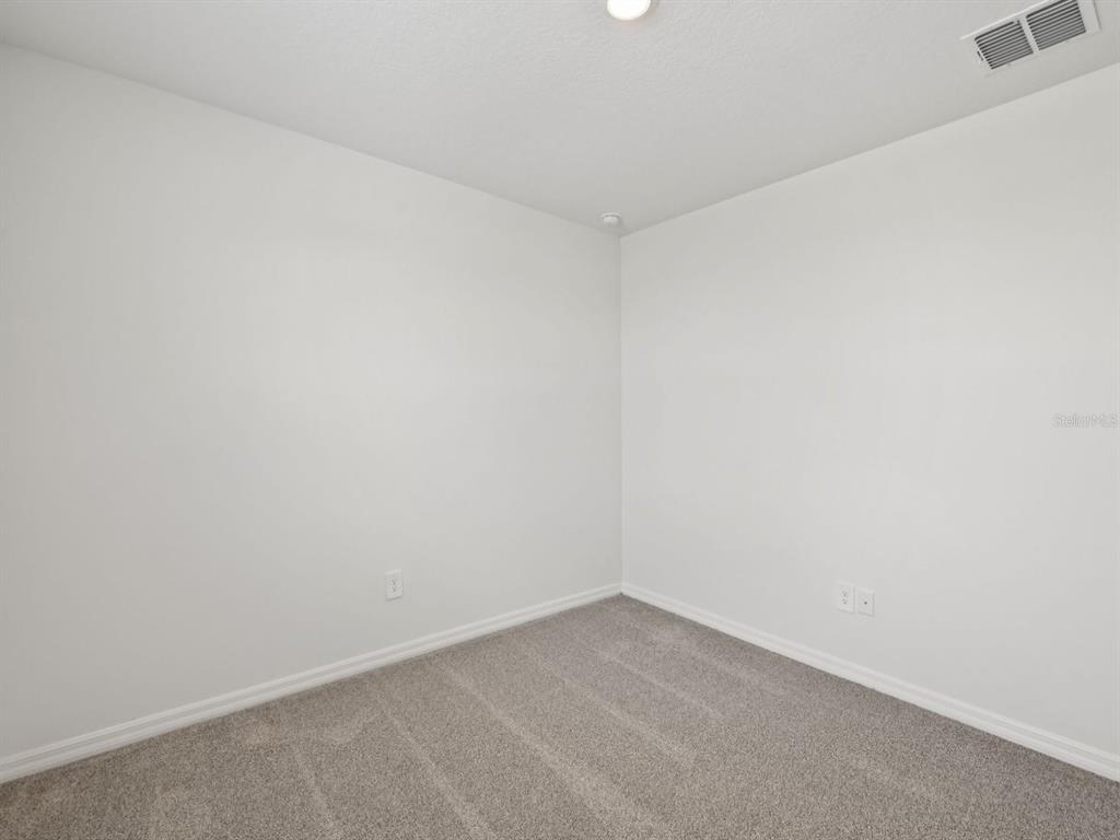 7628 Satterfield Terrace Parrish, FL 34219 - Photo 15 of 25 a view of an empty room