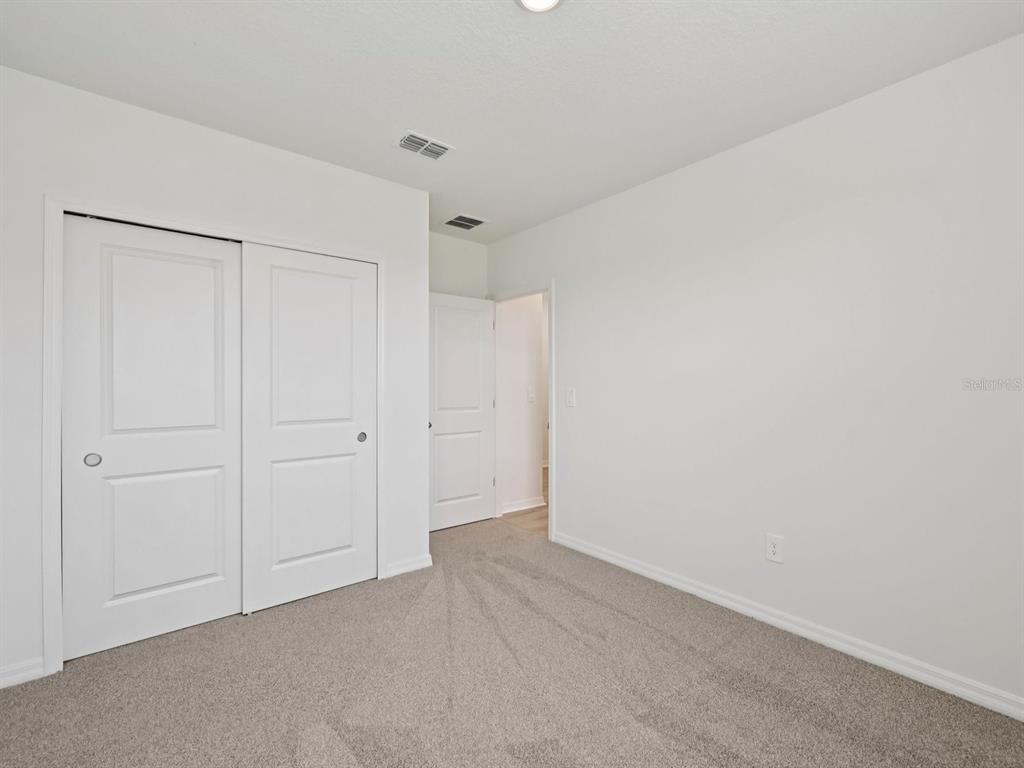 7628 Satterfield Terrace Parrish, FL 34219 - Photo 18 of 25 a view of an empty room