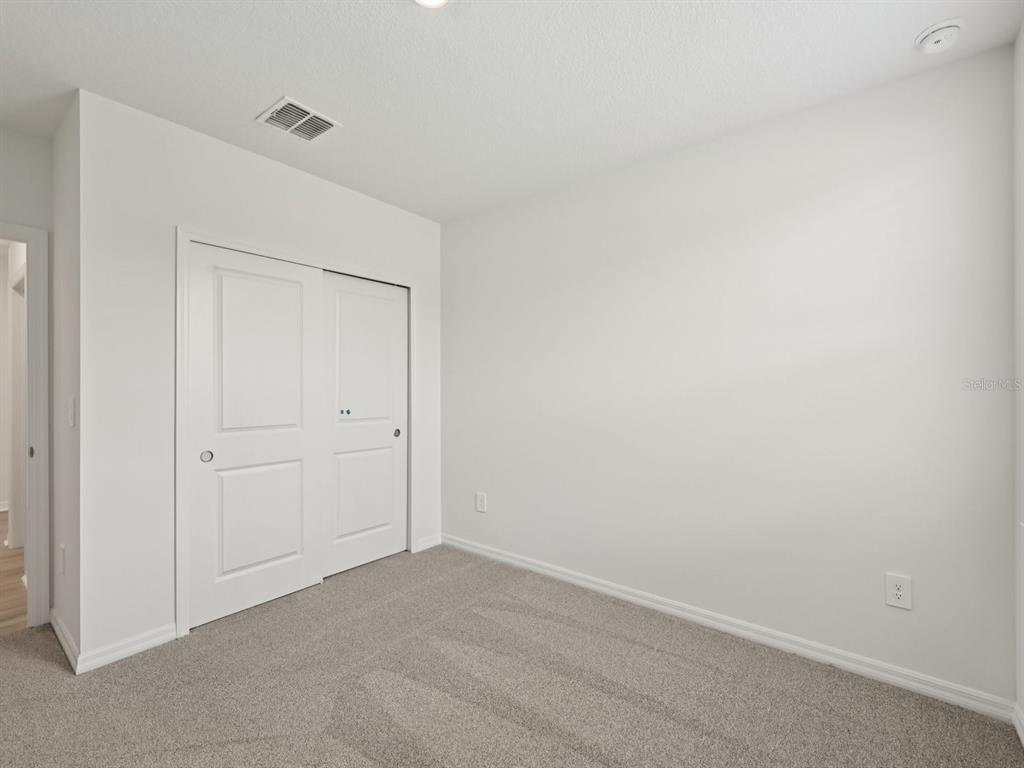 7628 Satterfield Terrace Parrish, FL 34219 - Photo 20 of 25 a view of an empty room